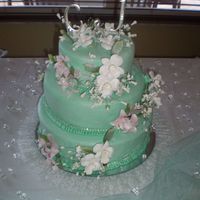 049.jpg cake turqesa con flores e orquideas blancas y rosas