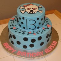 13Th Birthday Skull Cake This is exactly what she wanted! Blue cake, black circles, black stars, black scrolls with pink hearts and a skull on top. Buttercream cake...