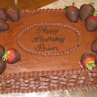 Chocolate Basket Cake My hubbys requested bday cake. Tried to make a "manly" cake, hence the black writing. LOL Please ignore his fingermark in the...