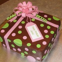 11Th Birthday Cake My first square cake iced in chocolate. Ugh, I had a terrible time trying to get it smooth! Also my first bow. For my niece, she loved it...