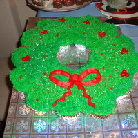 Christmas Wreath Cupcake Cake My 1st attempt at a Cupcake Cake. It was easy. I entered it in our Annual Cookie Exchange Party. Everyone loved it!!! I used 9 cupcakes in...