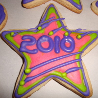2010 New Year Cookies Happy New Year Cookies!!! Just testing out colors and shapes using nfsc and antonia74 royal icing (my fav). Getting better at making them...