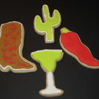 First Attempt At Cookies I took a cookie class last night and I'm hooked. They were a ton of fun and I can't wait to try other designs, etc.