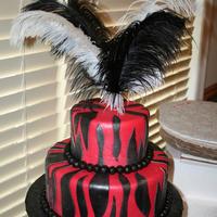 Sassy Valentine's Day Cake This cake is covered in red fondant and black fondant zebra stripes.