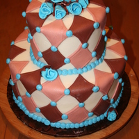 Brown And Blue Diamond This cake was created to match the theme of a baby boy's room.
