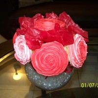 First Cupcake Bouquet This is my very first cupcake bouquet. The roses are made of BC. Hope u like it!!!