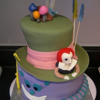 Alice In Wonderland mad hatters hat and some of the characters. hat is 3 6" rounds carved bottom is 8" round. covered in mmf with mmf characters