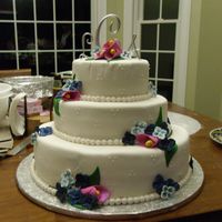 My First Wedding Cake Made this for my friends wedding that I was also in! First time ever making a wedding cake. Had some issues with the fondant but love how...