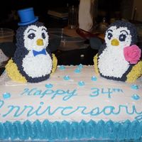 Penguin Anniversary Cake This was my first cake that I made for fun (and not just for class)! My parents love penguins so I made this for their 34th anniversary!
