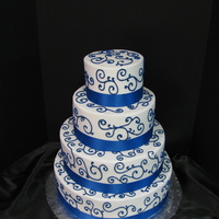 Abby's Sapphire Blue All BC with purchased sapphire blue ribbon trim. This cake was delivered the night before the wedding due to the impending Oklahoma March...