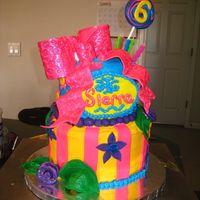 My Daughter's 6Th Birthday Cake Bottom layer is 8 inch French Vanilla w/Cream Cheese Filling and top layer is 6 inch Strawberry w/Cream Cheese Filling...Frosted in...