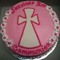 100_1665.jpg Chocolate cake with chocolate puddine, Cake done is BC, fondant cross, Lettering, flowers and cross outline is RI