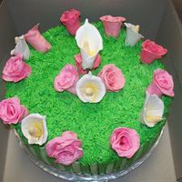 100_1727.jpg My first attempt at gumpaste flowers. I learned a lot from this cake, but not to shabby for a self-taught newbie!