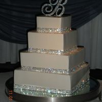 Bling Wedding Cake 1st wedding cake. Made this for my sister's wedding. 1st & 3rd tier is macsmom caramel frappuccino cake (bride's favorite...
