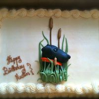 Austin's Lab Fondant details. Dog is molded by hand.