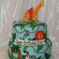 Jungle Birthday 8" and 10" covered in fondant. Made to match party decorations.