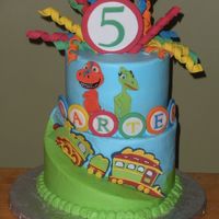 Dinosaur Train Birthday The top was a 6" and the bottom was carved from an 8". Thanks to the great tutorial on CC. The dinosaurs and train were fondant,...