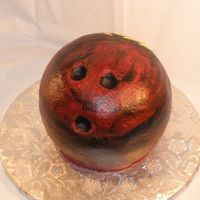 Bowling Ball This was a groom's cake. It was made to look just like his ball. It was carved from 3-10" rounds that were stacked. It is done in...