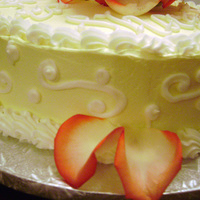 Birthday Cake 50th Birthday cake. Buttercream frosting, fresh roses (used floral picks to keep the rose stems from touching the food). Lemon curd filling...