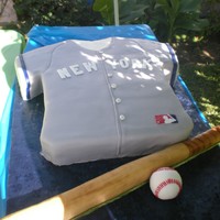 David's B-Day Cay 2 1/2 sheet cake with rice crispy ball and bat covered with fondant