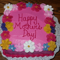 Mother's Day Cake French vanilla cake with buttercream icing and royal icing flowers.