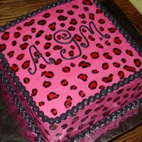 Pink Leopard Graduation Cake French Vanilla cake w/"Extra Special Buttercream" and Mocha Buttercream filling. Graduate's initials monogrammed on top....