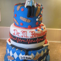 Medical School Graduation Top tier is carrot cake with cream cheese filling. Second tier is a yellow cake variation of WASC cake with a cookies and cream buttercream...