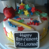 Teacher Retirement Made for a teacher who was retiring from a local school. Cake was WV(vanilla)SC cake with chocolate ganache. The apple is RKT with fondant...