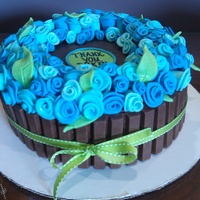 Flowers For Dbkp The cake I made for my last day at my job today before I go off to work at an actual cake shop!! All roses are fondant. The cake is a WVSC...