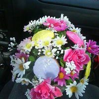 Pink , Purple, And Yellow Cupcake Bouquet This cupcake bouquet was for a friends anniversary. I bought a beautiful vase and used the florist styrofoam(green). I cut it to fit the...