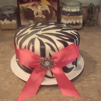 Zebra Print Marshmallow fondant with a real bow.
