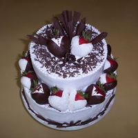 His And Hers This cake I made for my cousin's shower. 10" and 6" two-layered chocolate cakes iced with Bettercreme and decorated with...