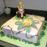 Fairy Baby Shower Cake Fairy themed baby shower cake with baby made from my new First Impressions mold. Fairy and baby are made from gumpaste. Cake is covered in...