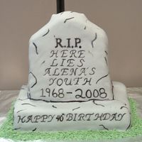 40Th Birthday Tombstone I made this cake for my boss's 40th birthday. It was chocolate cake covered in MMF.