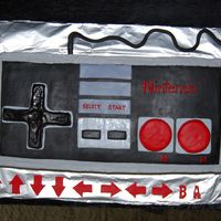 Nintendo Controller Old school Nintendo controller. Complete with Konami code at the bottom (all the super nerds know what that means).