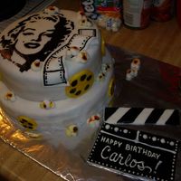 Carlos's Marylin Cake This is a Marylin Monroe cake that I hand painted for my uncle's birthday. He loves her so i thought it would be fitting to make this...