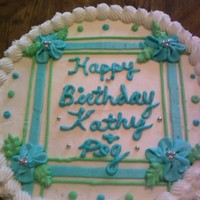 Lemon Cake With Raspberry Butter Filling A variation on the theme used by lillidalla in her lovely cake on this site. Converted design to fit a round cake, but loved the colors so...