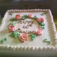 Ring Of Roses WASC cake with raspberry filling and Extra Special Buttercream frosting. It was a 2 layer 12x12 cake...ivory frosting, peach-colored roses...