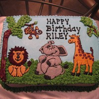 Zoo/jungle Animals Cake I did this using my cake projector. It's all buttercream.