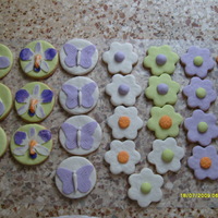 Birthday Cookies my first cookies ever! Decorated with fondant. These were made for 2 special bd's; one person likes the orchids, the other the ballet...