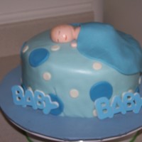 Baby Shower Cake Blue Baby shower cake with baby on top
