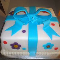 First Fondant Cake Wilton course 3 second cake, it was also my first fondant cake.I found the corners very hard, the rest was pretty easyWASC cake with...