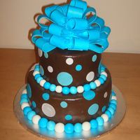 Wilton Course 3 Final This is my final cake for wilton course 3, though there is nothing wilton about this, lol!Chocolate MMF with MMF accents. (ok the loopy bow...
