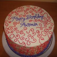 First Non Wilton Cake Birthday cake for my friend.2 9" cake pans torted and filled with sugarshack's buttercream icing.Buttercream swirls.