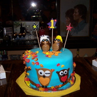 Fall Owls Fondant wrapped four layered cake with owl fondant cutouts. The toppers were made with fondant but the base shape is actually a hard boiled...