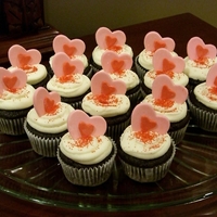 Valentine Cupcakes Chocolate cupcakes with buttercream frosting. I made the hearts out of fondant.