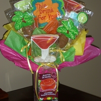 Cocktail Cookie Bouquet I made this for my friends birthday. She loved the one I gave her last year so much that I changed the theme to represent our families...