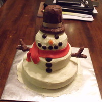 Snowman 3 tier snowman, carrot cake. Real carrot nose. RKT hat dipped in almond bark. arms are pretzel rods broken into shape and dipped in almond...