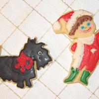 Scottie And Jack Frost (Colored As An Elf) The elf (Jack Frost) cookie just made me laugh -- I used red glace' for the smile and then decided I wanted white non-pariels on the...