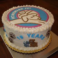 Pet Shelter Auction Cake Pet shelter's logo on top and cute little animals on the side. Color flow and buttercream.